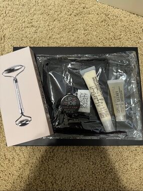Beauty Society roller, cloth, lip scrub, serum and lip mask